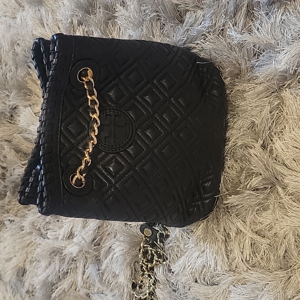 Tory Burch small beautiful soft and new quilted bucket backbag or shoulder bag
